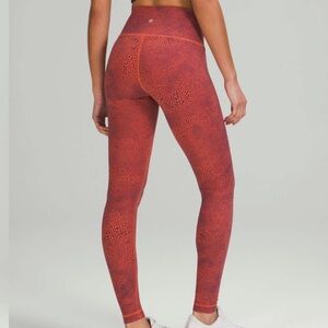 Lululemon Wunder Train High-Rise Tight 28"
Crackle Glaze Vintage Orange Larkspur